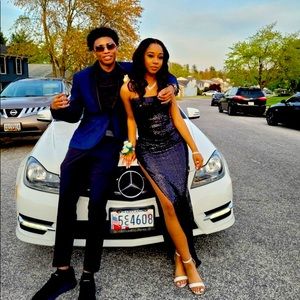 long black strapless sequin dress has a slit on side comfortable material inside